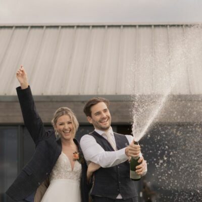 Champagne Spray at Wiltshire Wedding - The Falkenburgs